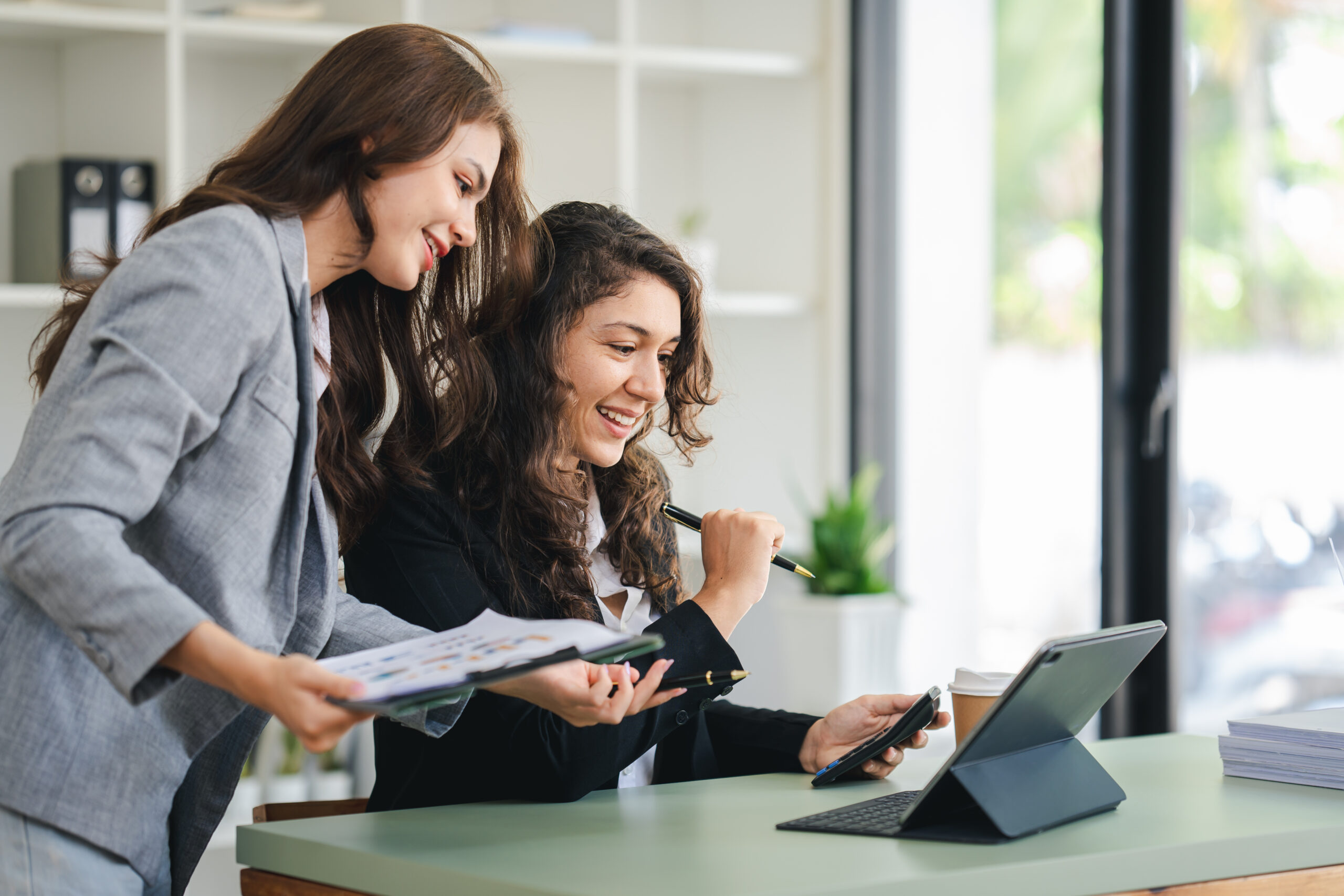 girl working together offer ideas to each other
happy young business colleagues working in the office