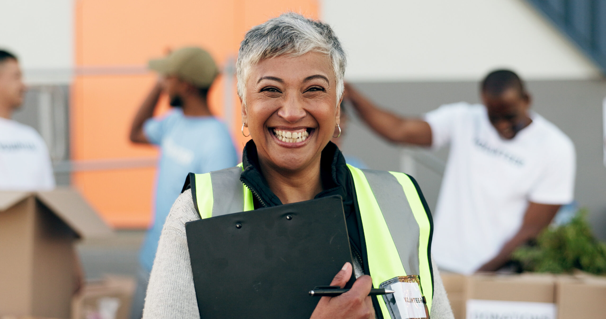 Woman, clipboard and donation for charity, volunteer and organizer for outreach program, smile and portrait. Happy senior person, non profit and support in social responsibility for NGO foundation.